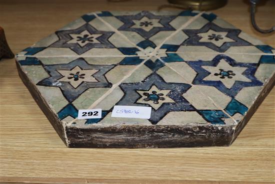 An Islamic hexagonal tile, 43cm sq.